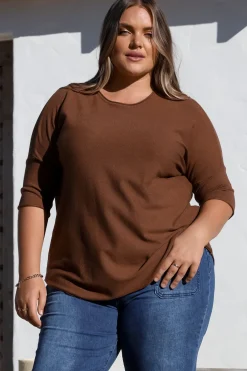 Allegra Knit Top - Crew Neck Curved Hem Box Silhouette Top in Chocolate><noscript><img width=