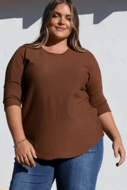 Allegra Knit Top - Crew Neck Curved Hem Box Silhouette Top in Chocolate><noscript><img width=