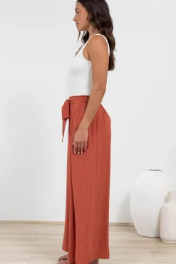 Malta Pants - High Waisted Wide Leg Pants with Tie Waist in Rust><noscript><img width=