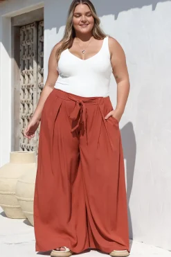 Malta Pants - High Waisted Wide Leg Pants with Tie Waist in Rust><noscript><img width=