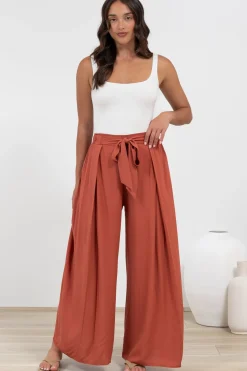 Malta Pants - High Waisted Wide Leg Pants with Tie Waist in Rust><noscript><img width=
