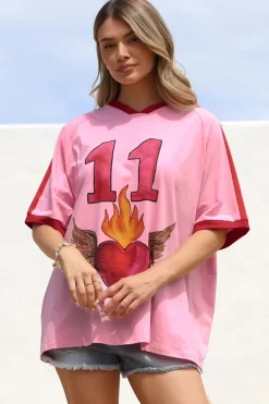 Pink 11 Tee - Graphic Print Short Sleeve T-Shirt with Racer Stripe Sleeves in Pink><noscript><img width=